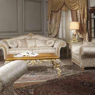 Classic living room Imperial, fabric finish, composed by a two seater sofa and two armchairs. Carved and golden details and cymatium