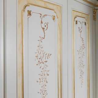 Classic modular wardrobe with flower decorations, golden details and carvings