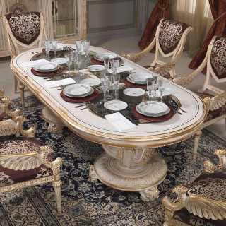 Great oval table with carved chairs Luigi XVI style from the White and Gold collection. All white over gold finish