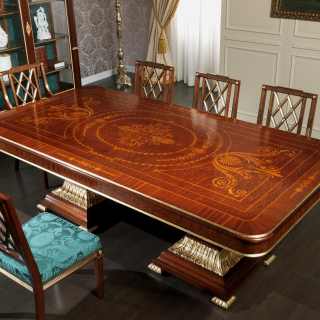 Ermitage table impero style with carvings and marquetry, carved chairs. All mahogany wood with gold leaf details