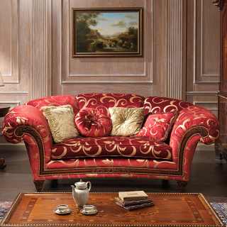 Classic living room Palace, red and gold fabric finish, composed by sofa with carved walnut details and a carved and inlayed table