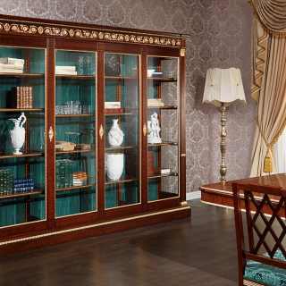 Ermitage glass showcase impero style with handmade carvings. Mahogany wood, brass decorations and gold leaf details