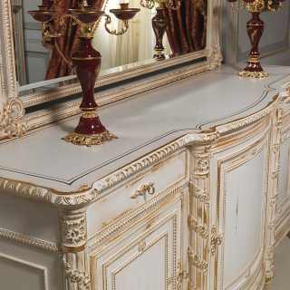 Classic luxury dining room White and Gold: wooden sideboard Luigi XVI style with mirror. All white over gold finish, handmade carvings