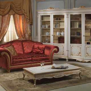 Classic living room with carved glass showcase Luigi Xv style, from classic collection Venezia. Carved table white over gold, carved Imperial sofa