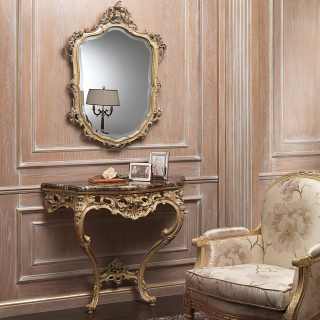 Console and wall mirror on classic boiserie