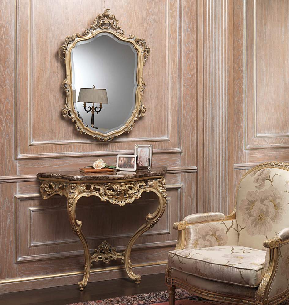 Carved console and mirror on boiserie